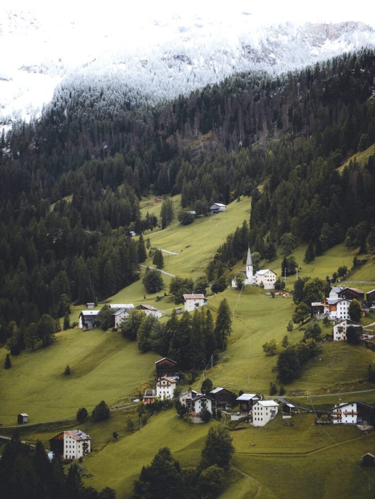 Village in a green Dolomites valley